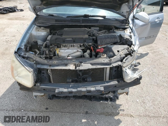 2007 Kia Spectra EX with VIN KNAFE121275411319, listed as a Copart auction lot 58716045 with 309,488 mi miles and Salvage title. Bid and sale history available at DreamBid. Image 11.