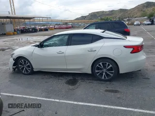 2016 Nissan Maxima SR with VIN 1N4AA6AP4GC449440, listed as a IAAI auction lot 41756271 with 136,685 mi miles and . Bid and sale history available at DreamBid. Image 14.