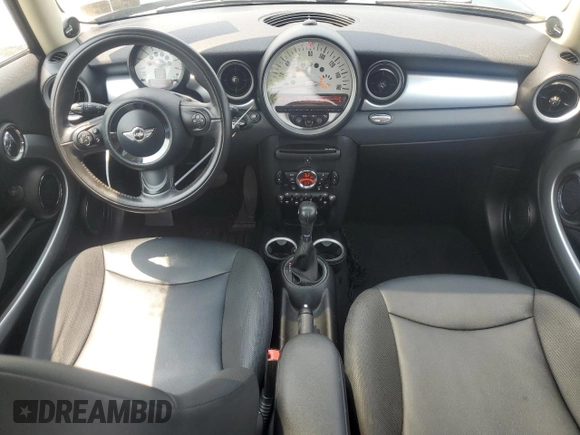 2011 MINI Hardtop with VIN WMWSU3C51BTX95581, listed as a Copart auction lot 60443995 with 157,213 mi miles and Salvage title. Bid and sale history available at DreamBid. Image 8.