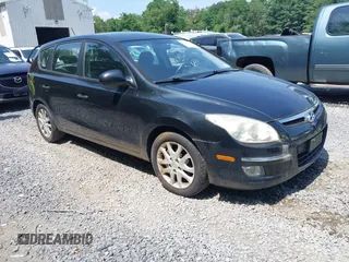 2009 Hyundai Elantra Touring with VIN KMHDC86E09U045550, listed as a IAAI auction lot 42812096 with 115,006 mi miles and . Bid and sale history available at DreamBid. Image 1.