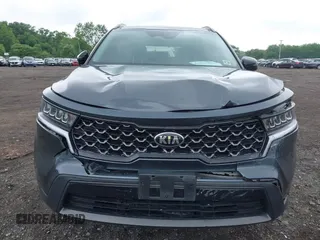 2021 Kia Sorento S z VIN 5XYRLDLC4MG070290, wystawiony jako IAAI lot #42473481 z przebiegiem 40 800 mil mil oraz . Historia ofert i sprzedaży dostępna na DreamBid. Obrazek 12.