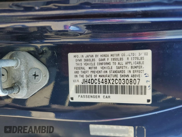 2002 Acura RSX Auto with VIN JH4DC548X2C030807, listed as a Copart auction lot 65178665 with 138,260 mi miles and Salvage title. Bid and sale history available at DreamBid. Image 12.