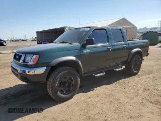 2000 Nissan Frontier XE with VIN 1N6ED27Y5YC351754, listed as a Copart auction lot 56603375 with 135,881 mi miles and Clean title. Bid and sale history available at DreamBid. Image 1.