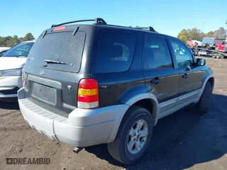 2007 Ford Escape XLT with VIN 1FMYU93167KA03558, listed as a IAAI auction lot 41641444 with 182,382 mi miles. Bid and sale history available at carsss.com. Image 4.