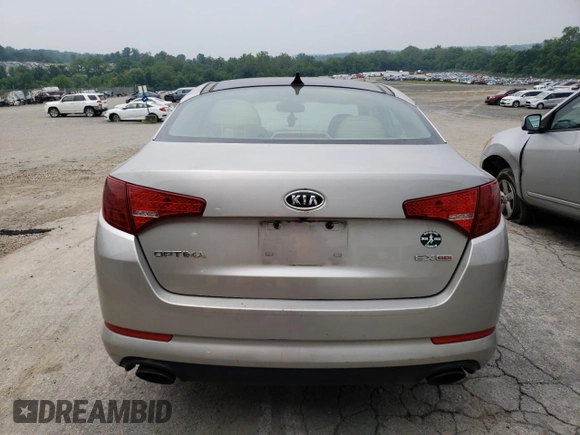 2013 Kia Optima EX z VIN 5XXGN4A75DG168207, wystawiony jako Copart lot #59992435 z przebiegiem 147 298 mil mil oraz Czysty tytuł • Clean title. Historia ofert i sprzedaży dostępna na DreamBid. Obrazek 6.