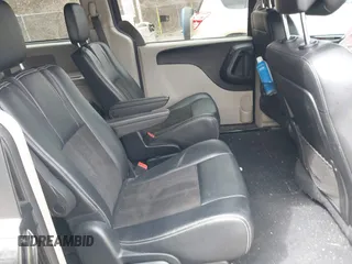 2019 Dodge Grand Caravan SXT with VIN 2C4RDGCG9KR804867, listed as a IAAI auction lot 42032311 with 157,351 mi miles and . Bid and sale history available at DreamBid. Image 8.