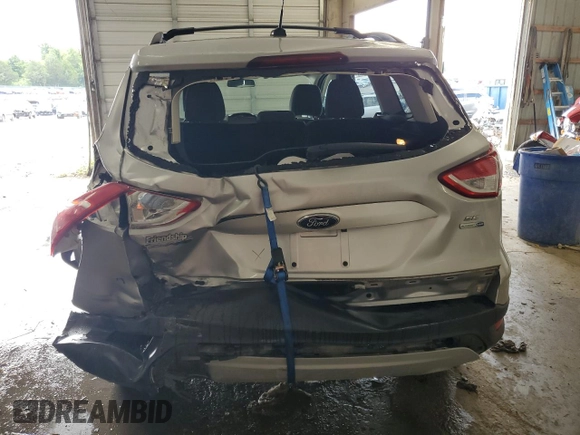 2013 Ford Escape SE with VIN 1FMCU9GX3DUD32274, listed as a Copart auction lot 63778235 with 161,288 mi miles and Salvage title. Bid and sale history available at DreamBid. Image 6.