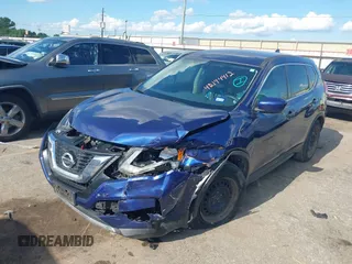 2017 Nissan Rogue SV with VIN JN8AT2MT1HW130104, listed as a IAAI auction lot 42194412 with 98,958 mi miles and . Bid and sale history available at DreamBid. Image 2.