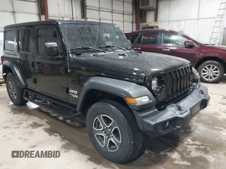 2020 Jeep Wrangler Unlimited Sport Altitude with VIN 1C4HJXDG7LW259232, listed as a IAAI auction lot 41952458 with 53,579 mi miles and . Bid and sale history available at DreamBid. Image 1.