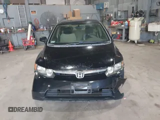 2006 Honda Civic LX z VIN 1HGFA165X6L103659, wystawiony jako IAAI lot #42579482 z przebiegiem 201 436 mil mil oraz . Historia ofert i sprzedaży dostępna na DreamBid. Obrazek 12.