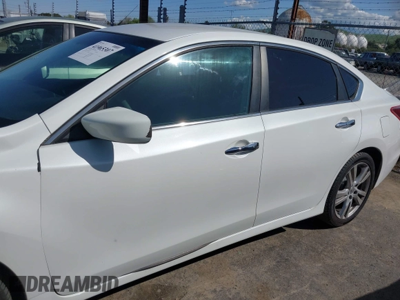 2013 Nissan Altima SV with VIN 1N4BL3AP7DN485216, listed as a IAAI auction lot 41965307 with 145,410 mi miles and . Bid and sale history available at DreamBid. Image 14.
