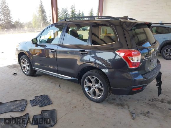 2016 Subaru Forester Touring with VIN JF2SJAXC0GH564305, listed as a IAAI auction lot 42111356 with 75,529 mi miles and . Bid and sale history available at DreamBid. Image 3.