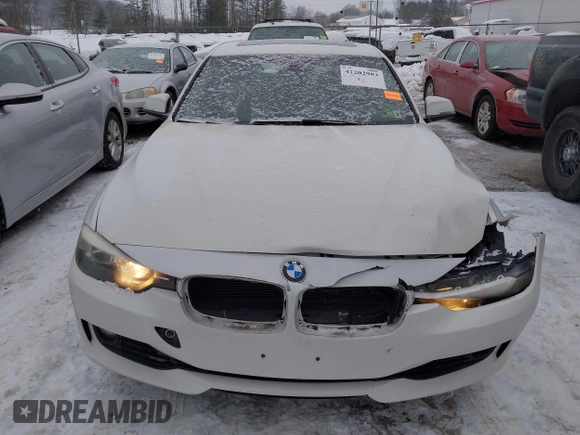 2014 BMW 3 Series 328i with VIN WBA3C1C51EK106435, listed as a IAAI auction lot 41202983 with 142,135 mi miles. Bid and sale history available at carsss.com. Image 6.