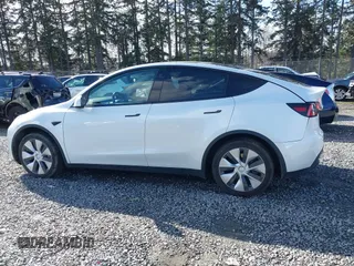 2021 Tesla Model Y Standard Range with VIN 5YJYGDED9MF110697, listed as a IAAI auction lot 41707730 with Not Provided miles and . Bid and sale history available at carsss.com. Image 14.