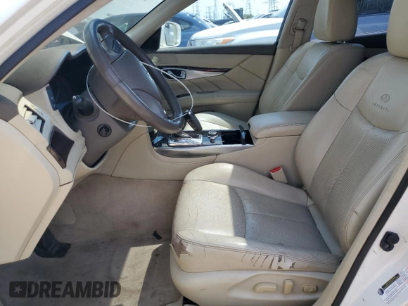 2013 Infiniti M with VIN JN1BY1AP8DM511833, listed as a Copart auction lot 63459025 with 152,722 mi miles and Clean title. Bid and sale history available at DreamBid. Image 7.