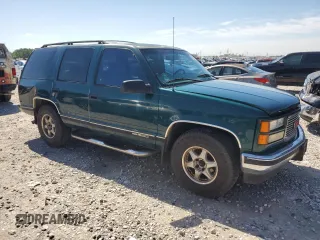 1999 GMC Yukon with VIN 1GKEC13R8XJ792078, listed as a Copart auction lot 50903294 with 232,672 mi miles and Salvage Title. Bid and sale history available at carsss.com. Image 4.