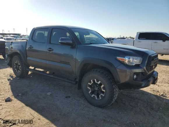 2019 Toyota Tacoma 4WD SR with VIN 3TMCZ5AN7KM287170, listed as a Copart auction lot 48313365 with 75,986 mi miles and Salvage Title. Bid and sale history available at carsss.com. Image 4.