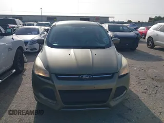 2013 Ford Escape SE z VIN 1FMCU0GX2DUD94471, wystawiony jako IAAI lot #42655476 z przebiegiem 146 578 mil mil oraz . Historia ofert i sprzedaży dostępna na DreamBid. Obrazek 6.