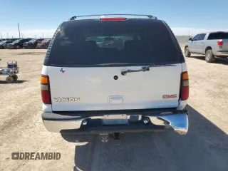2001 GMC Yukon SLT z VIN 1GKEC13T81J152049, wystawiony jako Copart lot #56494675 z przebiegiem 160 102 mil mil oraz Szkoda całkowita • Salvage title. Historia ofert i sprzedaży dostępna na DreamBid. Obrazek 6.