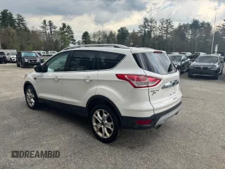 2014 Ford Escape Titanium with VIN 1FMCU9J94EUC63638, listed as a Copart auction lot 55880505 with 198,112 mi miles and Clean Title. Bid and sale history available at DreamBid. Image 3.