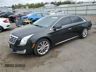 2013 Cadillac XTS Luxury z VIN 2G61R5S37D9127597, wystawiony jako Copart lot #53841755 z przebiegiem 81 603 mil mil oraz Szkoda całkowita • Salvage title. Historia ofert i sprzedaży dostępna na DreamBid. Obrazek 1.