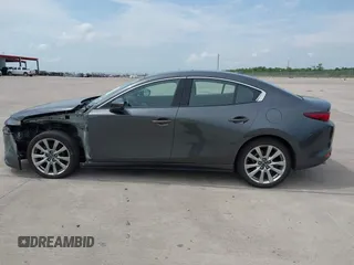 2023 Mazda 3 S Premium with VIN 3MZBPBDM3PM383238, listed as a IAAI auction lot 42477596 with 24,233 mi miles and . Bid and sale history available at DreamBid. Image 14.