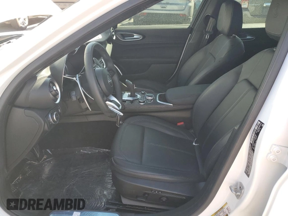 2023 Alfa Romeo Giulia with VIN ZARFAMAN9P7667245, listed as a Copart auction lot 49924525 with 4,799 mi miles and Salvage title. Bid and sale history available at DreamBid. Image 7.