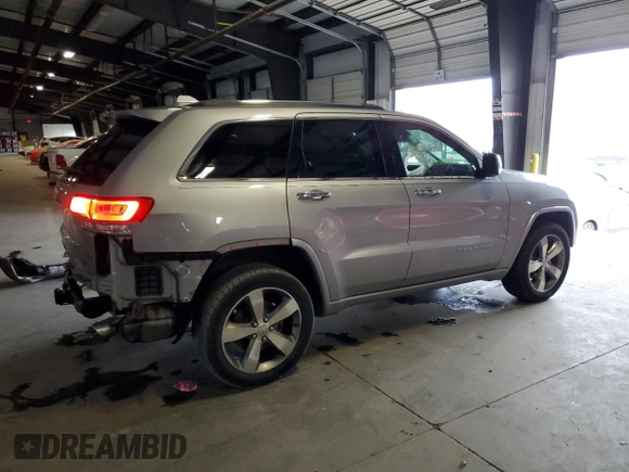 2015 Jeep Grand Cherokee High Altitude with VIN 1C4RJECG7FC781715, listed as a Copart auction lot 73321744 with 0 mi miles and Salvage Title. Bid and sale history available at carsss.com. Image 3.
