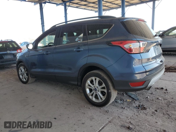2018 Ford Escape SE with VIN 1FMCU0GD3JUA56773, listed as a Copart auction lot 52814445 with 70,194 mi miles and Salvage Title. Bid and sale history available at carsss.com. Image 2.