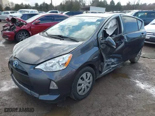 2014 Toyota Prius c One with VIN JTDKDTB38E1075360, listed as a IAAI auction lot 41418483 with 203,708 mi miles. Bid and sale history available at carsss.com. Image 16.
