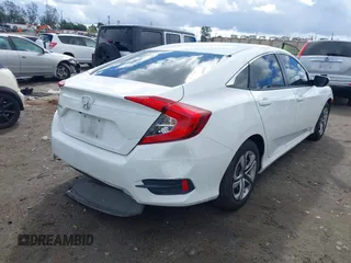 2018 Honda Civic LX with VIN 2HGFC2F5XJH603214, listed as a IAAI auction lot 41788384 with 114,876 mi miles and . Bid and sale history available at carsss.com. Image 4.