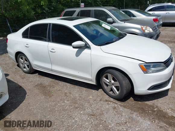 2013 Volkswagen Jetta TDI w/Premium/Nav with VIN 3VWLL7AJ9DM300544, listed as a IAAI auction lot 42401610 with 157,585 mi miles and . Bid and sale history available at DreamBid. Image 1.