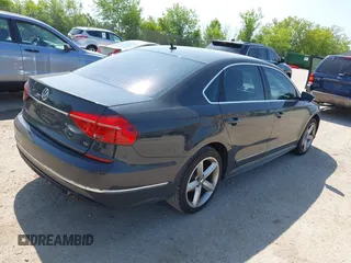 2016 Volkswagen Passat S with VIN 1VWAT7A31GC035276, listed as a IAAI auction lot 42525661 with 112,292 mi miles and . Bid and sale history available at DreamBid. Image 4.