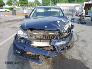 2014 Mercedes-Benz C 300 Sport with VIN WDDGF8AB1EA945171, listed as a IAAI auction lot 42089028 with 122,701 mi miles and . Bid and sale history available at DreamBid. Image 12.