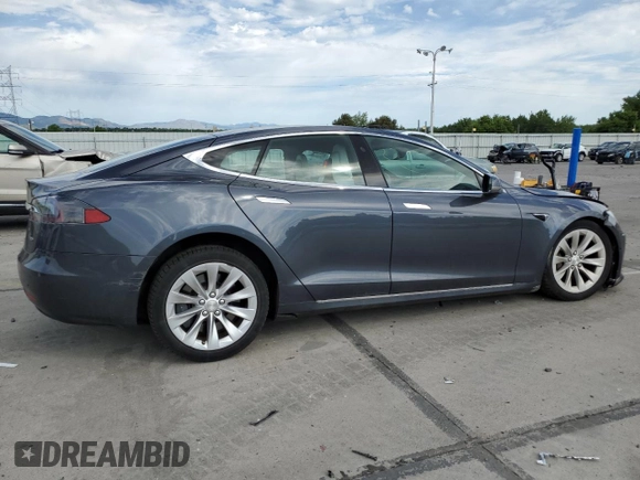 2017 Tesla Model S 100D z VIN 5YJSA1E25HF187898, wystawiony jako Copart lot #60829025 z przebiegiem 82 823 mil mil oraz Szkoda całkowita • Salvage title. Historia ofert i sprzedaży dostępna na DreamBid. Obrazek 3.