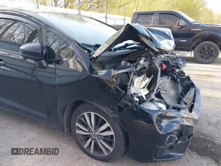 2015 Honda Fit EX with VIN 3HGGK5G82FM744840, listed as a IAAI auction lot 42138045 with 91,321 mi miles and . Bid and sale history available at DreamBid. Image 6.