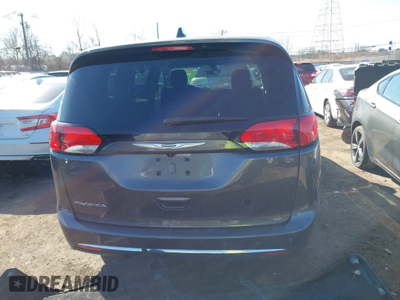 2019 Chrysler Pacifica Touring Plus z VIN 2C4RC1FG3KR708986, wystawiony jako IAAI lot #41744300 z przebiegiem 123 043 mil mil oraz . Historia ofert i sprzedaży dostępna na DreamBid. Obrazek 17.