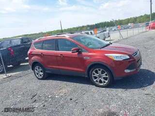 2015 Ford Escape Titanium with VIN 1FMCU0JX5FUB77475, listed as a IAAI auction lot 42103388 with 113,018 mi miles. Bid and sale history available at carsss.com. Image 13.