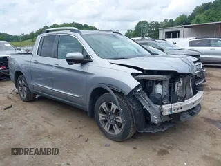 2017 Honda Ridgeline RTL-T z VIN 5FPYK2F69HB002385, wystawiony jako IAAI lot #42670875 z przebiegiem 74 937 mil mil oraz . Historia ofert i sprzedaży dostępna na DreamBid. Obrazek 1.