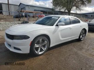 2015 Dodge Charger SXT z VIN 2C3CDXHG8FH772122, wystawiony jako Copart lot #79034204 z przebiegiem 122 542 mil mil oraz Szkoda całkowita • Salvage title. Historia ofert i sprzedaży dostępna na DreamBid. Obrazek 1.