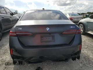 2024 BMW i5 M60 with VIN WBY43FK00RCR71826, listed as a Copart auction lot 72140144 with 5,987 mi miles and Salvage Title. Bid and sale history available at carsss.com. Image 6.