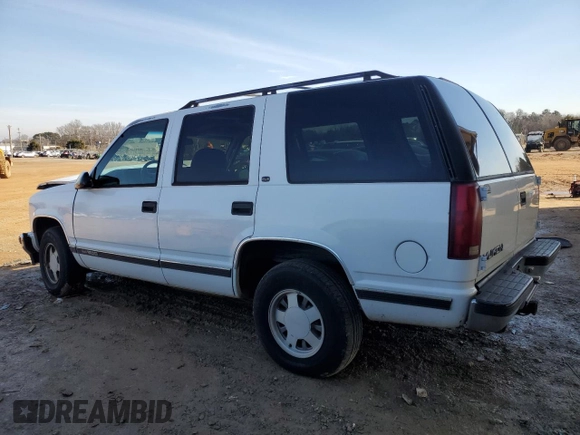 1999 GMC Yukon with VIN 1GKEC13R0XJ811710, listed as a Copart auction lot 43014995 with 311,948 mi miles and Salvage Title. Bid and sale history available at carsss.com. Image 2.