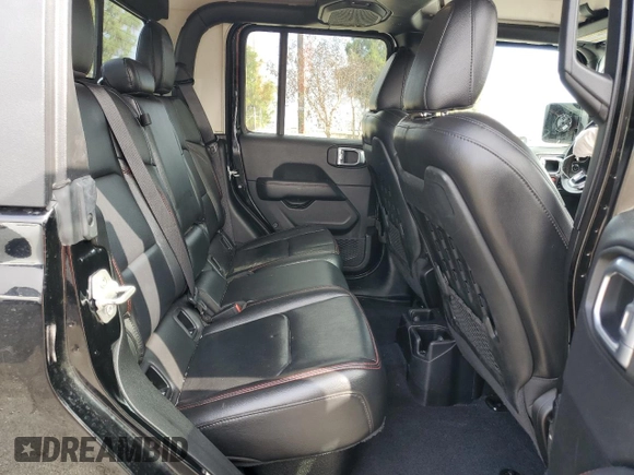 2020 Jeep Gladiator Rubicon z VIN 1C6JJTBG7LL197837, wystawiony jako Copart lot #58169095 z przebiegiem 59 578 mil mil oraz Szkoda całkowita • Salvage title. Historia ofert i sprzedaży dostępna na DreamBid. Obrazek 10.