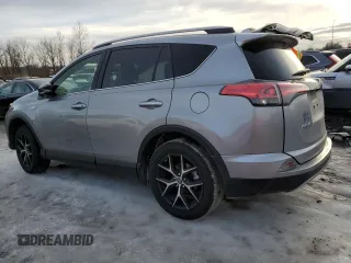 2018 Toyota RAV4 Hybrid SE z VIN JTMJJREV0JD246230, wystawiony jako Copart lot #89095135 z przebiegiem Nie podano mil oraz Szkoda całkowita • Salvage title. Historia ofert i sprzedaży dostępna na DreamBid. Obrazek 2.