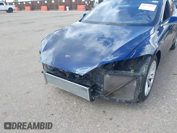 2016 Tesla Model S 70 with VIN 5YJSA1E18GF174200, listed as a IAAI auction lot 42274415 with 65,231 mi miles and . Bid and sale history available at DreamBid. Image 6.