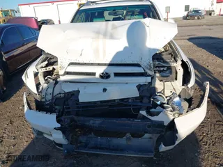 2004 Toyota 4Runner Limited with VIN JTEBT17R840040628, listed as a IAAI auction lot 41764159 with 165,096 mi miles. Bid and sale history available at carsss.com. Image 6.