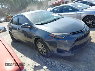 2019 Toyota Corolla L with VIN 2T1BURHE4KC134729, listed as a IAAI auction lot 41779629 with 240,685 mi miles. Bid and sale history available at carsss.com. Image 1.