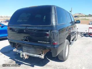 2001 Chevrolet Tahoe LT with VIN 1GNEC13T31R122882, listed as a IAAI auction lot 41999271 with 211,687 mi miles. Bid and sale history available at carsss.com. Image 4.