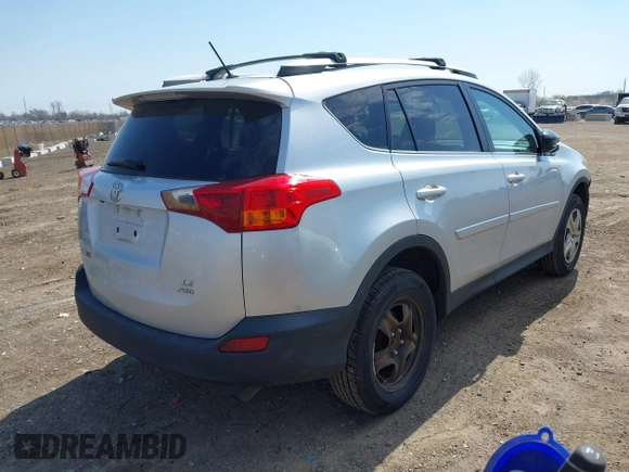 2014 Toyota RAV4 LE with VIN 2T3BFREV4EW136537, listed as a IAAI auction lot 42065728 with 211,039 mi miles and . Bid and sale history available at DreamBid. Image 4.