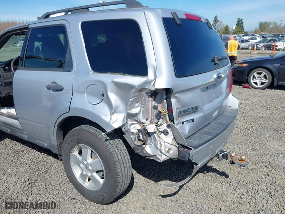 2010 Ford Escape XLT with VIN 1FMCU9D70AKD46774, listed as a IAAI auction lot 41857882 with 93,409 mi miles. Bid and sale history available at carsss.com. Image 6.